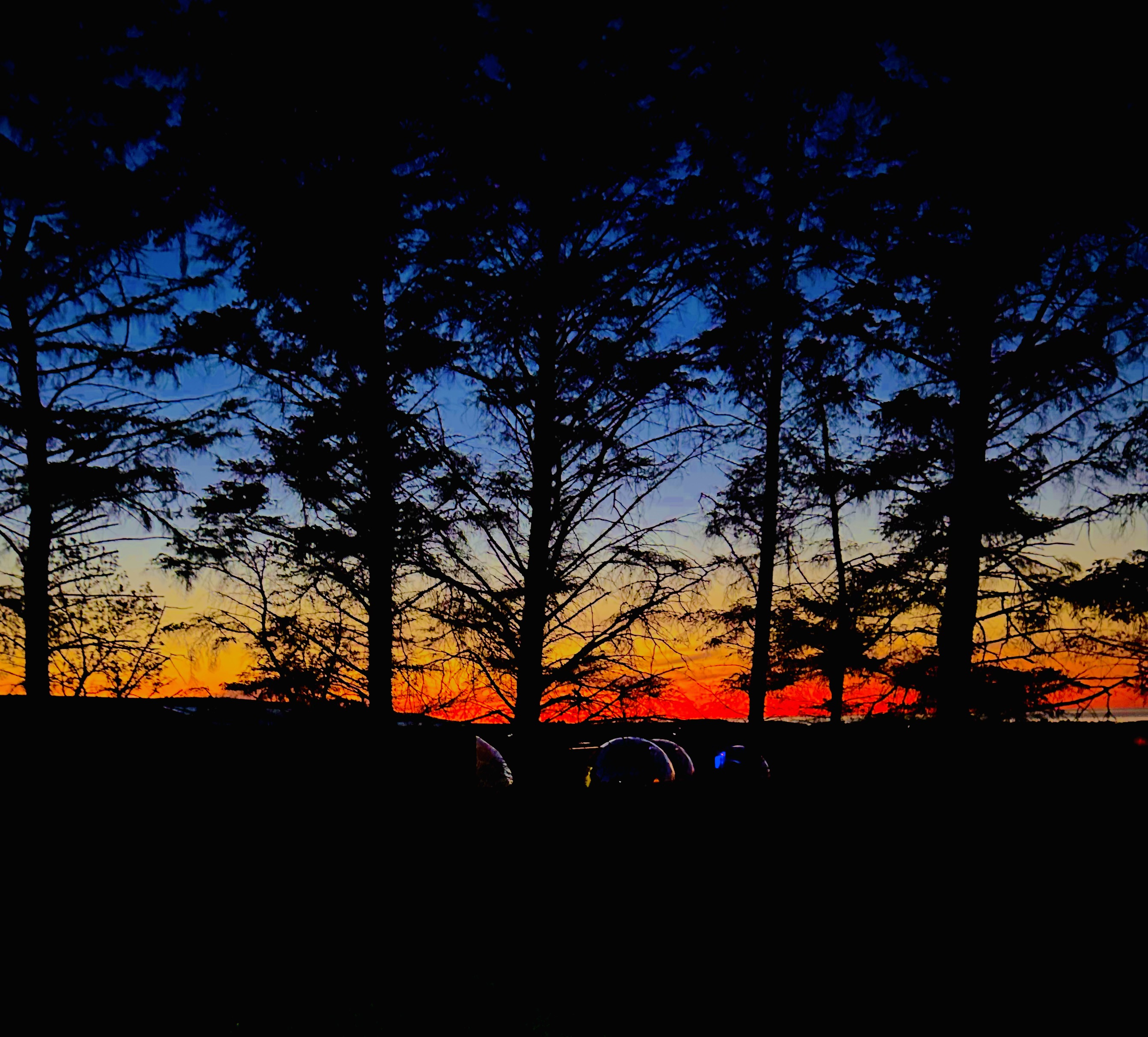 A mirrored dome silhouetted against a North Coast sunset